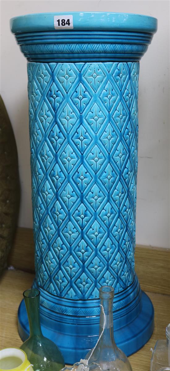A Burmantofts turquoise glazed jardiniere stand